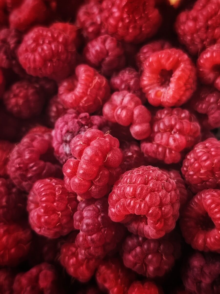 a pile of raspberries